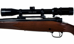 Winchester Model 70 Bolt-Action Rifle with Scope.